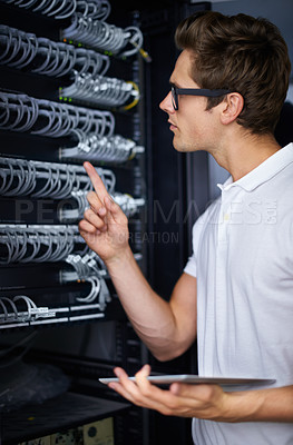 Buy stock photo Server room, information technology and man with tablet, check connectivity and night job. Cybersecurity system, it network or person for fiber internet, data center or storage with cable connection