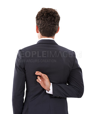 Buy stock photo A young businessman crossing his fingers behind his back
