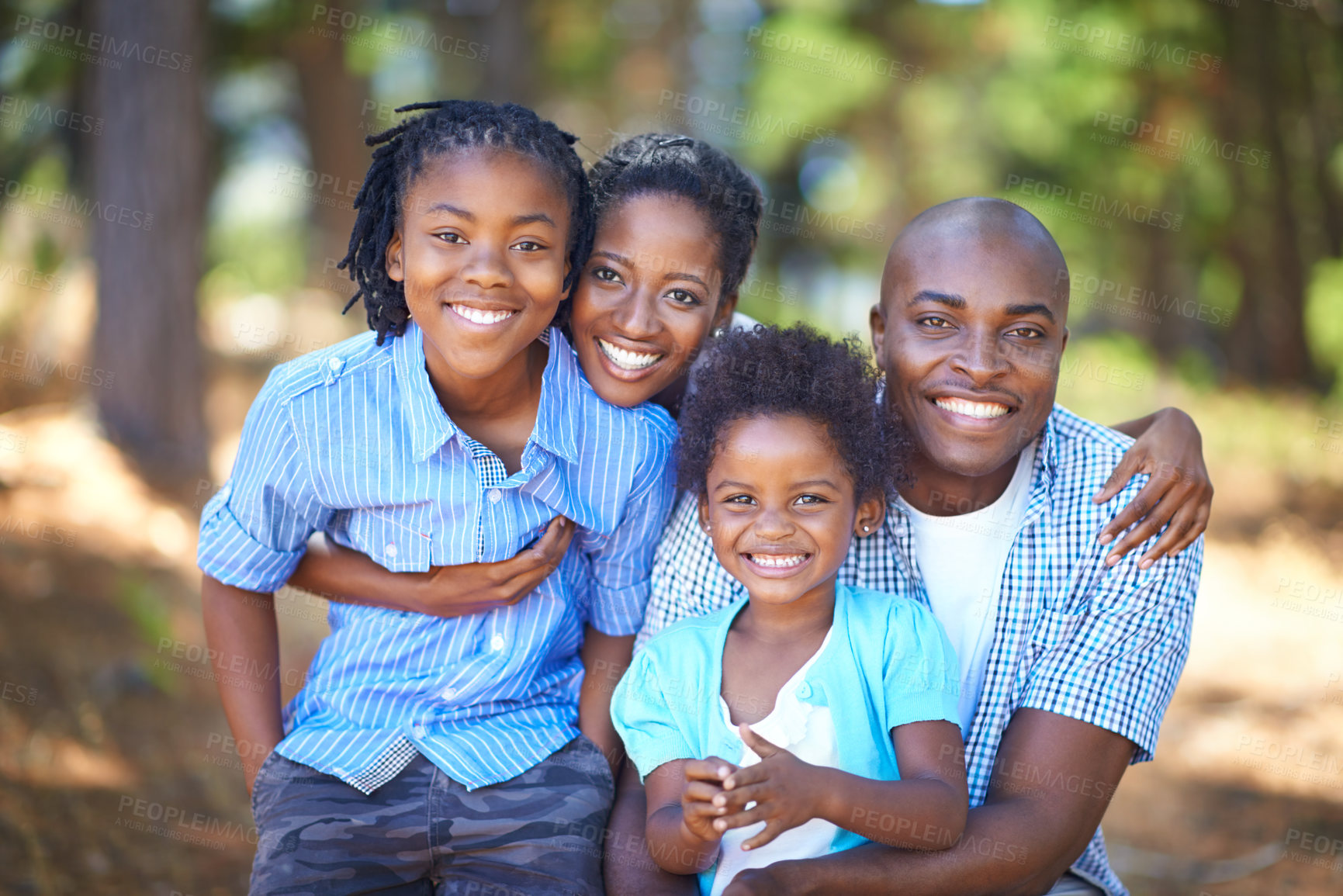 Buy stock photo Cute african american family spending time out in nature together