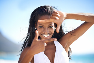 Buy stock photo Selfie frame, hands and black woman at a beach for portrait photography, memory or gesture in nature. Finger, border and face of African travel influencer with sign for screenshot or profile picture