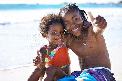 Buy stock photo Black children, portrait and thumbs up on beach for vacation, holiday or outdoor bonding together. Young happy African kids, brother and sister smile with like emoji, yes sign or OK by ocean coast