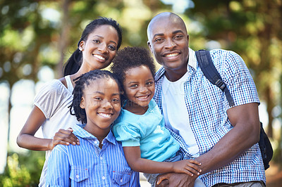 Buy stock photo Portrait of a happy african american family enjoying a day out in the forest