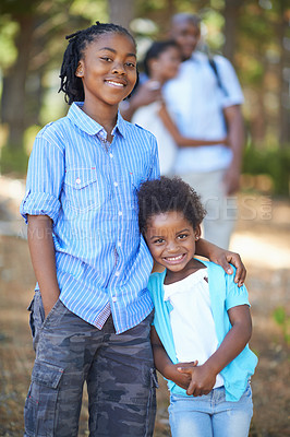 Buy stock photo Portrait, brother and sister hiking in the forest together with their parents for travel, freedom or adventure. Black family, nature or environment with a young boy and girl sibling in the woods