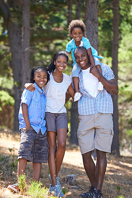 Buy stock photo Happy, portrait and black family in forest bonding, fun or walking in nature together. Love, support and children with parents in a park for hiking adventure, journey or travel, explore or vacation