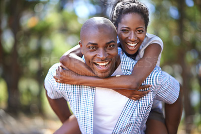 Buy stock photo Piggyback, portrait or black couple hiking in forest to relax or bond on holiday vacation together in nature. Happy, wellness or African woman with smile or man in woods trekking on outdoor adventure