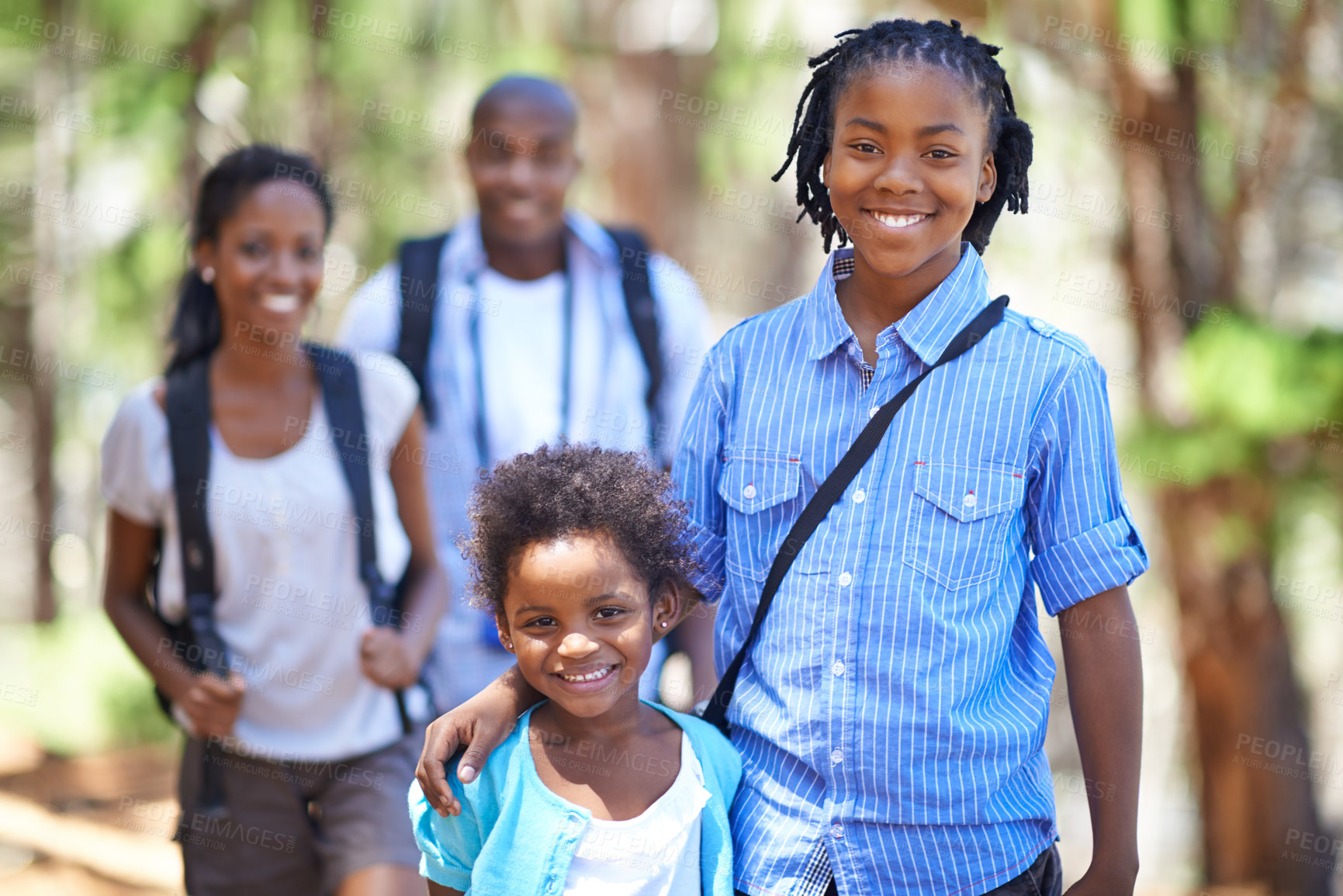 Buy stock photo Parents, portrait or happy kids hiking in forest to bond on holiday vacation together in nature. African children siblings, smile or black family walking in woods or park on a fun outdoor adventure