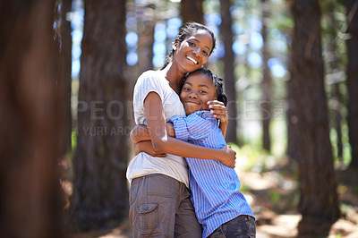 Buy stock photo Portrait, hiking and a mother hugging her son in the forest for travel, freedom or adventure together. Black family, love or smile with a happy young woman and boy child bonding outdoor in nature