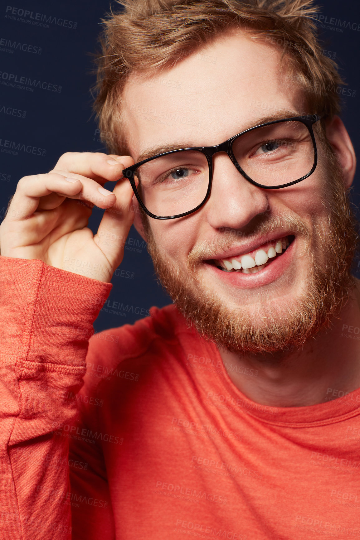 Buy stock photo Man, face and glasses for fashion or eye care with black frame and smile on dark background. Model is happy with prescription lens, designer eyewear and casual clothes in studio with style and vision