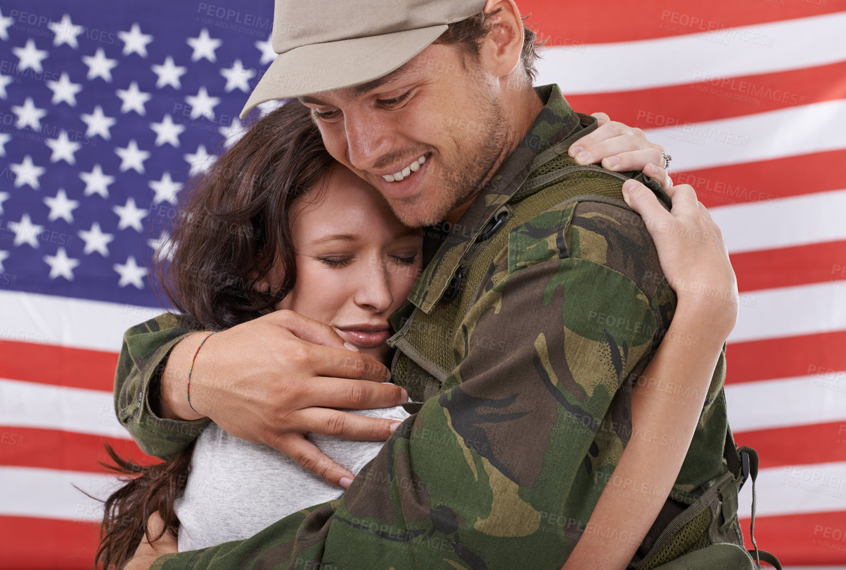 Buy stock photo American couple hug, reunion after war and people with love and welcome hero back with flag. Soldier in army, reunite with partner after military service and man in uniform is happy with woman 