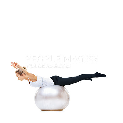 Buy stock photo Woman, ball or balance in studio space for workout, wellness or mobility exercise on white background. Athlete, training equipment or fitness for core challenge mockup, stretching body or flexibility