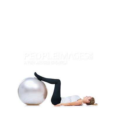 Buy stock photo Legs on ball, woman or balance in studio mockup for workout, wellness or exercise on white background. Athlete, training equipment or fitness for core challenge, body mobility or flexibility space 