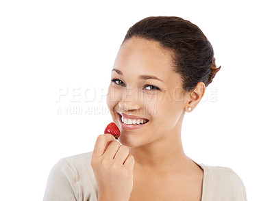 Buy stock photo Portrait, woman and eating strawberry in studio for healthy detox, vegan diet and nutrition on white background. Happy model, red berries and sustainable benefits of food, vitamin c and sweet fruits