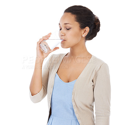 Buy stock photo Young woman drinking a glass of water - isolated on white