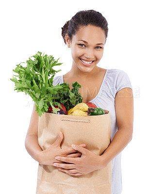 Buy stock photo Vegetables, shopping portrait and happy woman in studio for healthy food, sustainability or diet. Young person, customer or model with bag of groceries for discount or nutrition on a white background