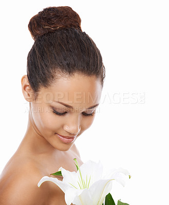 Buy stock photo Woman, flower and organic skincare in studio, smiling and happy with facial treatment by white background. Female person, joy and wellness or cosmetics and dermatology, beauty and sustainable product