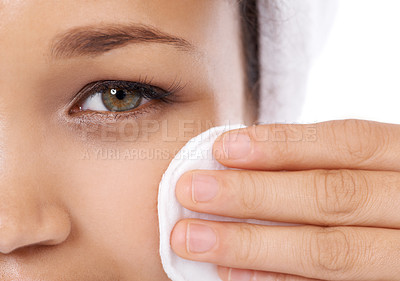 Buy stock photo Woman face, cotton pad and closeup for skin care, beauty and cosmetics product with dermatology results in studio. Portrait of person or model eye with hygiene wipe for makeup on a white background
