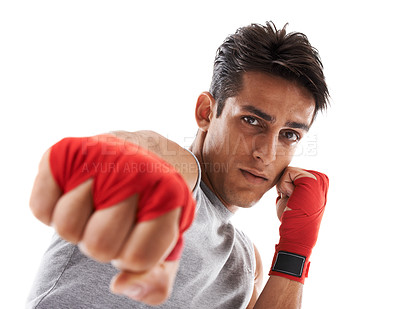 Buy stock photo Man, hand and punch in kickboxing and sports for fitness, health and martial arts on white background. Strong athlete in portrait, action and ready with fist, MMA training and exercise in studio