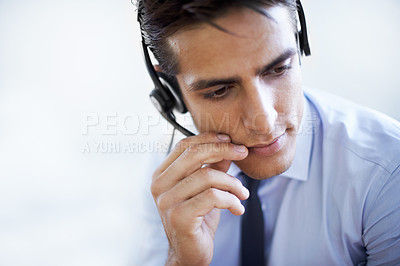 Buy stock photo Call center, man and communication in studio of customer service, CRM questions and help on white background. Face, serious telemarketing agent and thinking of telecom advisory, microphone and mockup