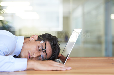 Buy stock photo Business man, laptop and sleeping at desk, exhausted and burnout in office or dreaming in workplace. Male professional, nap and overtime or overworked, stress and fatigue or tired and deadline