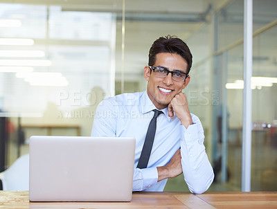 Buy stock photo Business man, portrait and smiling by laptop in office, email and online research for proposal. Male professional, businessperson and analysis on technology, happy and planning an agenda or schedule