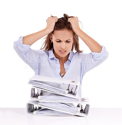 Buy stock photo Frustrated businesswoman with a stack of files in front of her - isolated on white