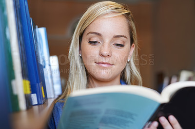 Buy stock photo Reading book, face or happy woman in library at university, college or school campus for education. Bookshelf, learning or female student with scholarship studying knowledge, research or information