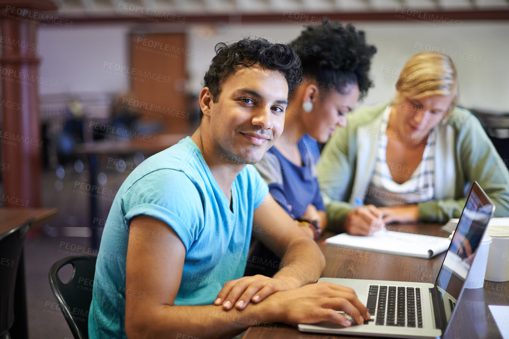 Buy stock photo Portrait of man, laptop or students in library studying for education in university, college or school. Smile, elearning or people with scholarship on campus reading news, research or online course