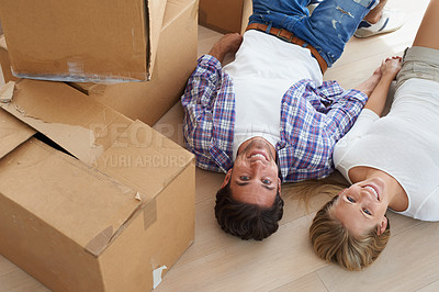 Buy stock photo Couple, boxes and happy with face for real estate, new home or property investment with romance or love. Moving, man and woman with smile or holding hands for fresh start, achievement and dream house
