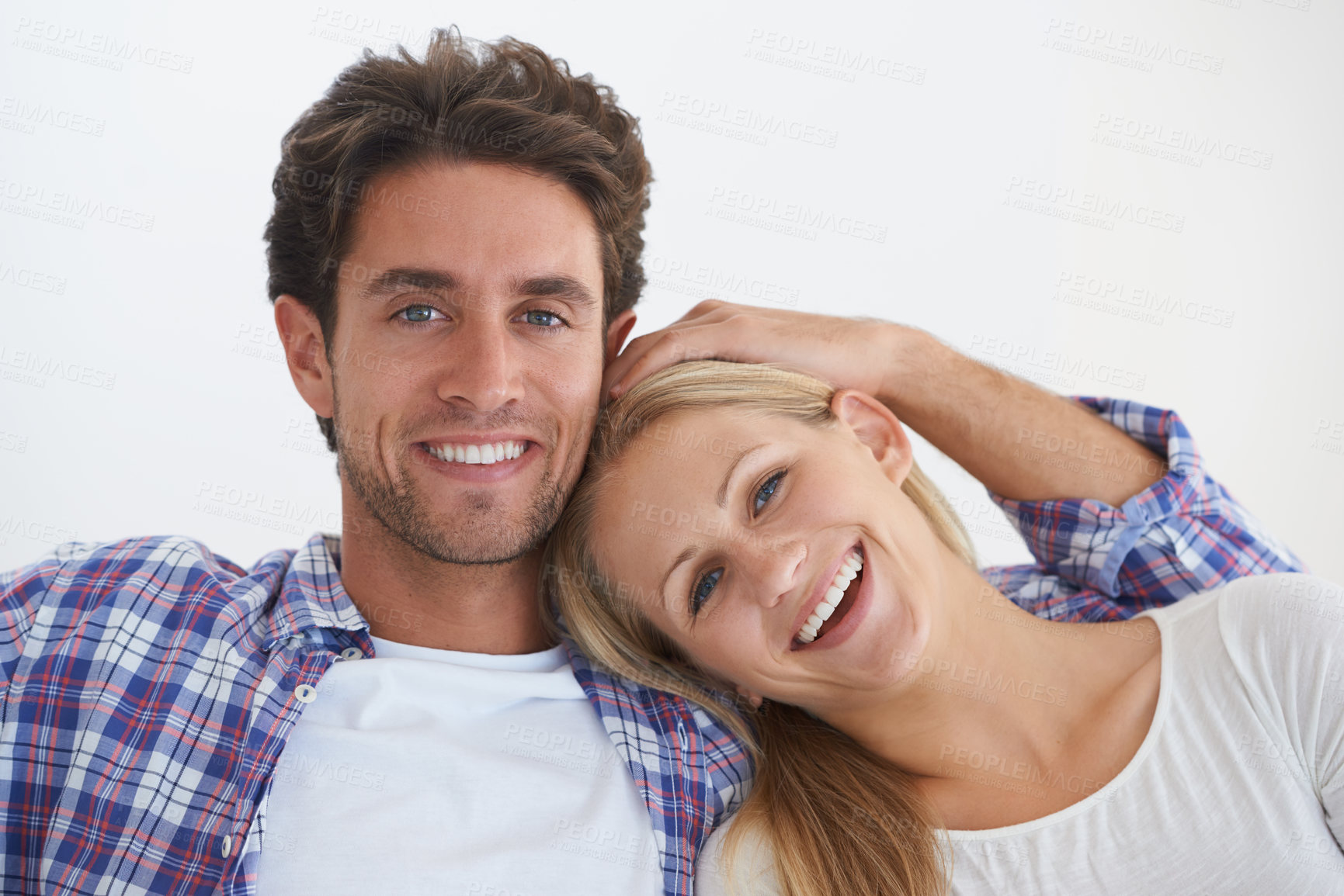 Buy stock photo Cropped shot of a happily married couple at home