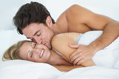 Buy stock photo Man, kiss or happy woman sleeping in bed for peace or dreaming to relax on holiday vacation. Wake up, romantic love or couple on break together enjoying nap, bedroom sleep or resting at night in home
