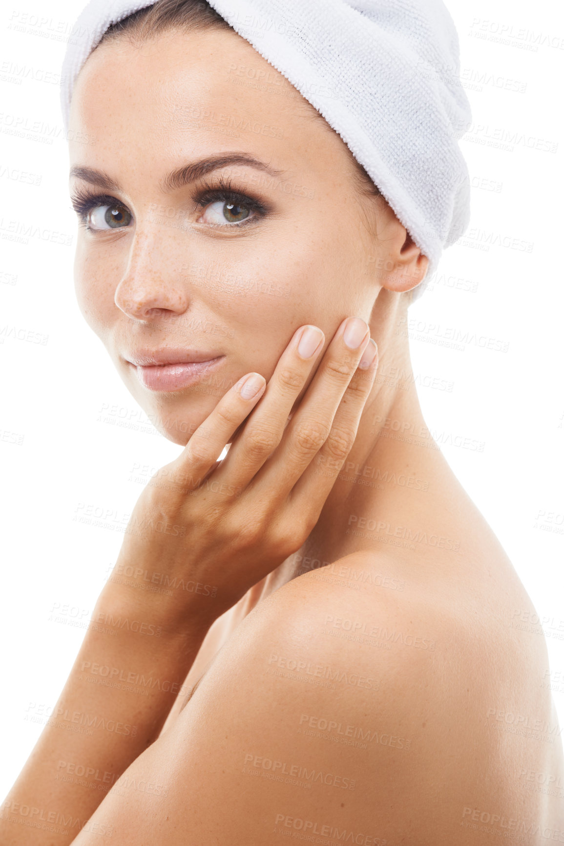 Buy stock photo Beautiful young woman touching her face while isolated against a white background