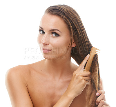 Buy stock photo Hair care, comb and portrait of woman in a studio for natural, health and salon treatment. Beauty, wellness and young female person from Canada brushing for hairstyle isolated by white background.