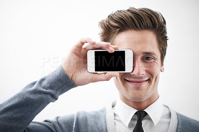 Buy stock photo Business man, blank phone screen and portrait to cover eye with mockup space by white background. Entrepreneur, person or employee with smartphone, smile and presentation for promotion with mobile ux