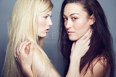 Buy stock photo Face, portrait and beauty of women couple in studio for makeup, cosmetics and lgbtq lifestyle. Seductive gay or lesbian people together on a grey background for self love, skin care and natural glow