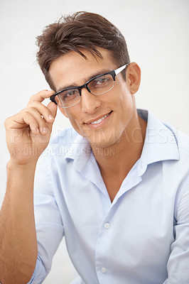 Buy stock photo Happy man, face and glasses choice for vision with eye care, optometry and professional style on white background. Smile in portrait for eyesight with fashion frame and prescription lens in studio