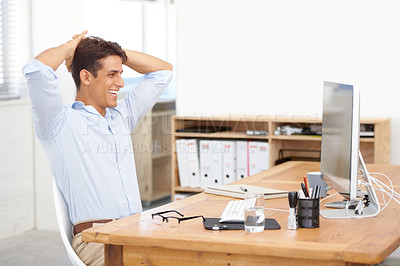 Buy stock photo Computer, relax or happy man in office on break for mental health, pride or wellness at his desk. Calm, freedom or male employee with smile or hand behind his head in a business stretching or resting