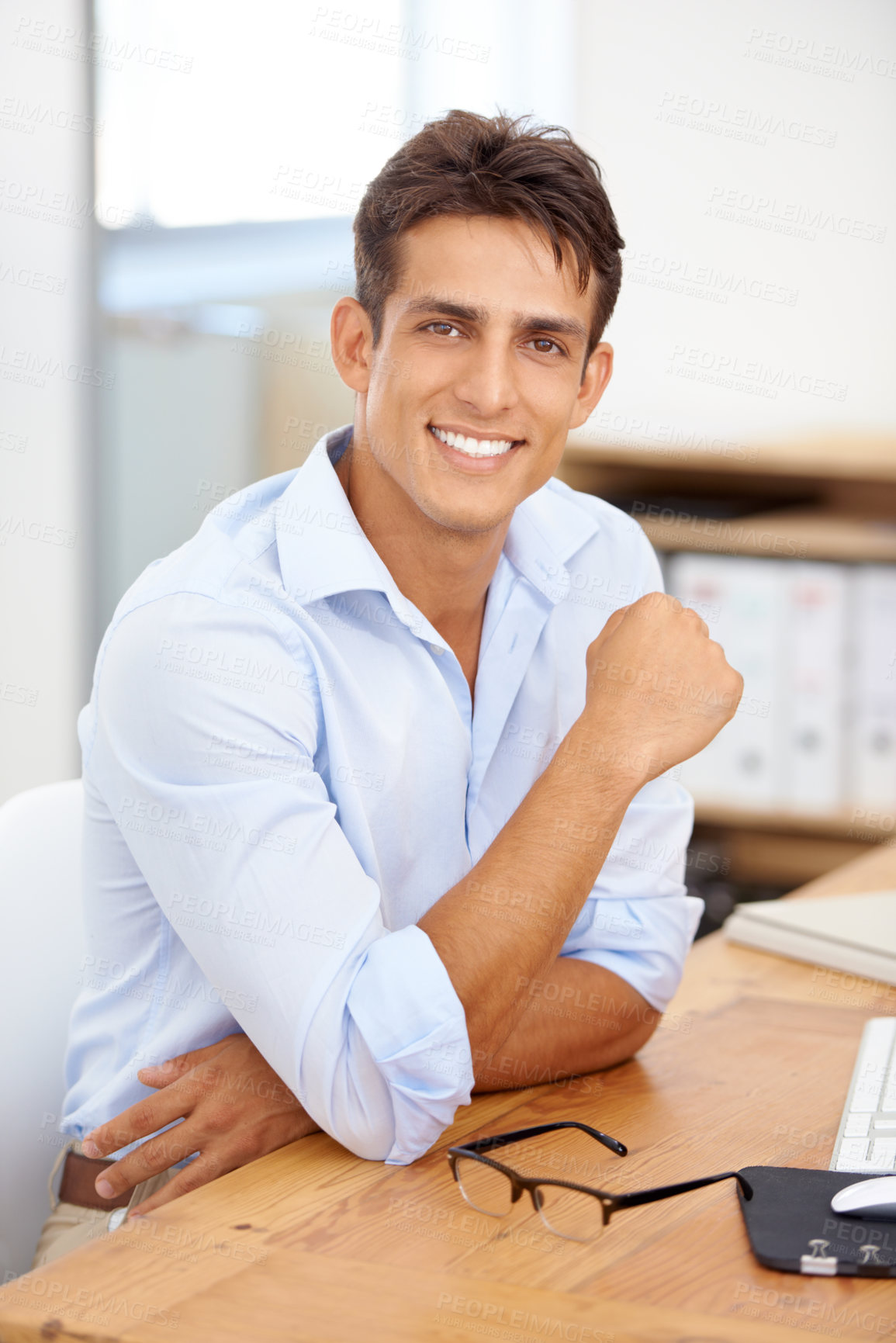 Buy stock photo Happy businessman, relax or portrait with confidence at office with pride for career ambition. Smile, manager or male employee with job opportunity at workplace, desk or table for a corporate company