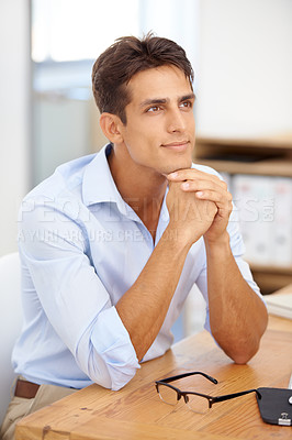 Buy stock photo Businessman, relax or thinking of ideas at office with pride for career ambition, dream or decision. Vision, manager or male employee with hand on chin at workplace, desk or table for job future