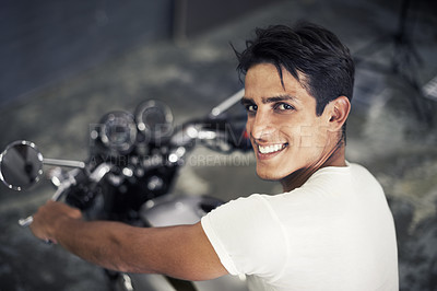 Buy stock photo Happy man, portrait and motorcycle vehicle in garage for travel, transportation or road trip adventure. Face of young handsome male person or biker smile on cool automobile or mechanical motorbike