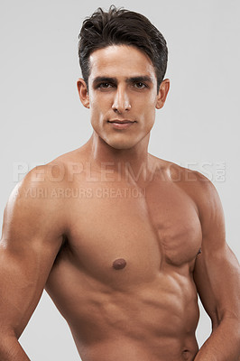 Buy stock photo Man, shirtless and portrait or bodybuilder pride in studio, abs and fitness by gray background. Male person, confident and strong core or muscular abdomen, face and results or progress from exercise
