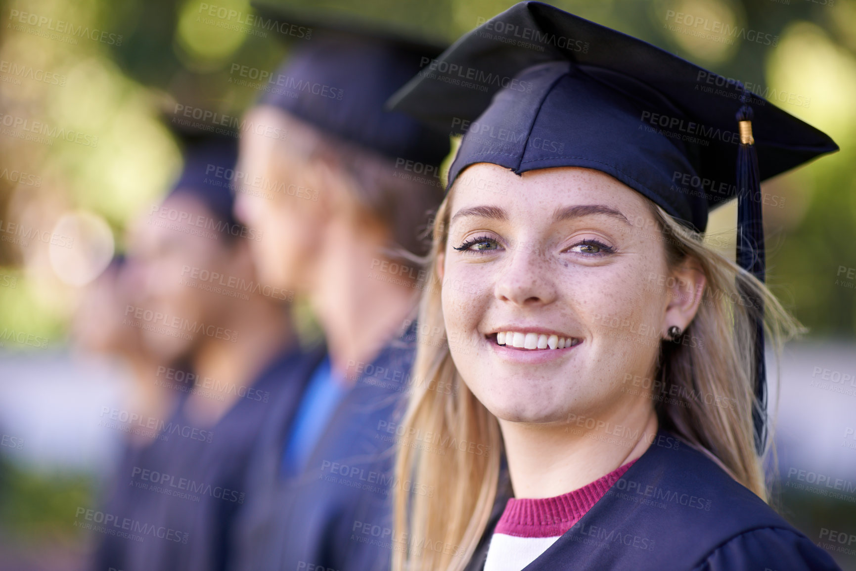 Buy stock photo Happy woman, portrait and student in outdoor graduation for education, learning or qualification. Female person or graduate smile in group for higher certificate, diploma or degree at campus ceremony