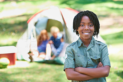 Buy stock photo Child, portrait and happy on adventure at campground, joy and relaxing on vacation or holiday. Black male person, smiling and face or confident in park, childhood and summer or freedom in nature