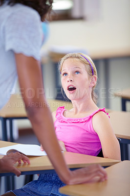 Buy stock photo Child, girl and surprise, student and teacher with amazed reaction to information and learning in class,.News, announcement and wow face, education and teaching with people at school for knowledge