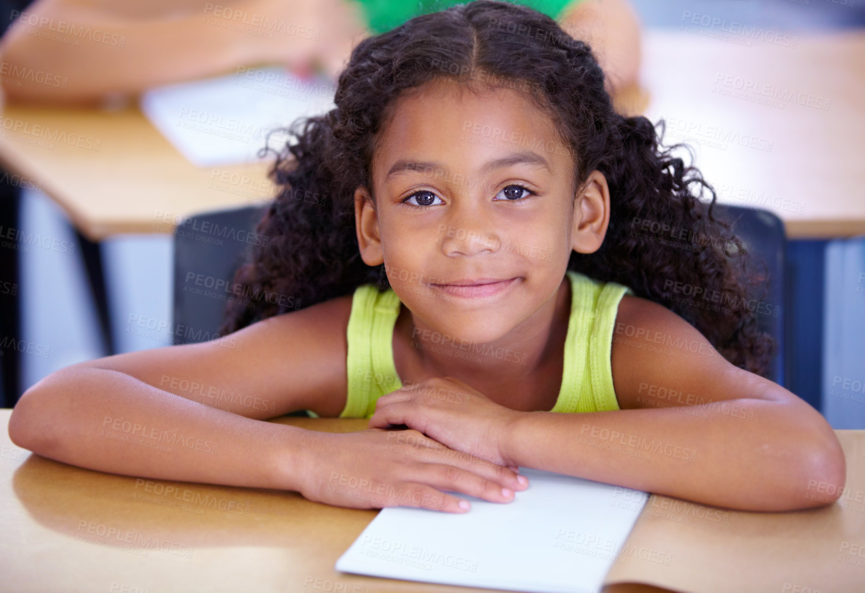 Buy stock photo Portrait, girl child or student in classroom for knowledge, education or development for future growth. Scholarship, back to school or happy kid with book or pride for studying or learning at desk