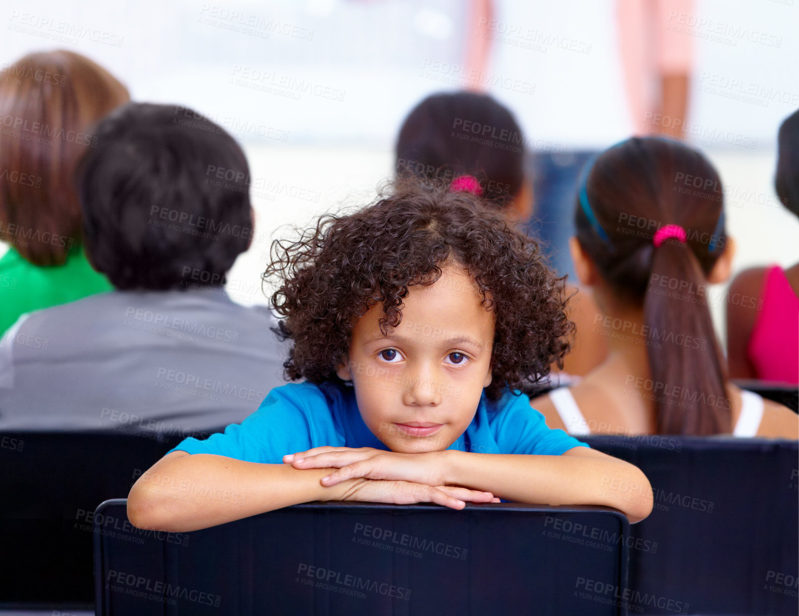 Buy stock photo Portrait, child or boy student in classroom for knowledge, education or development for future growth. Scholarship, back to school or young male kid ready for studying, listening or learning at desk