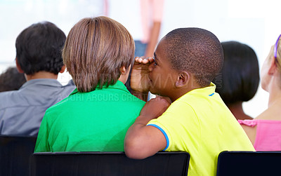 Buy stock photo Little boys, whisper and classroom in ear for secret, gossip or communication at school. Male person, students or friends listening to rumor, information or surprise in class together with teacher