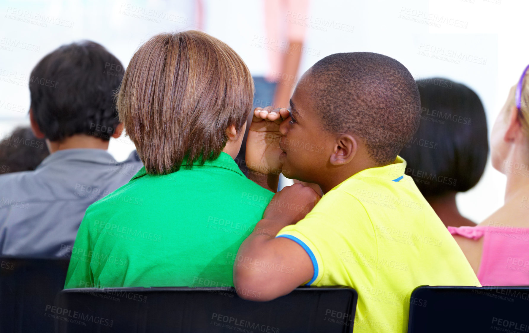 Buy stock photo Little boys, whisper and classroom in ear for secret, gossip or communication at school. Male person, students or friends listening to rumor, information or surprise in class together with teacher