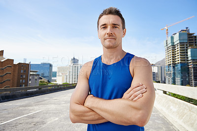 Buy stock photo Man, arms crossed in city and fitness outdoor with workout, training and athlete in portrait for sports. Confidence, face and exercise on urban bridge, health and wellness with sportswear in Chicago