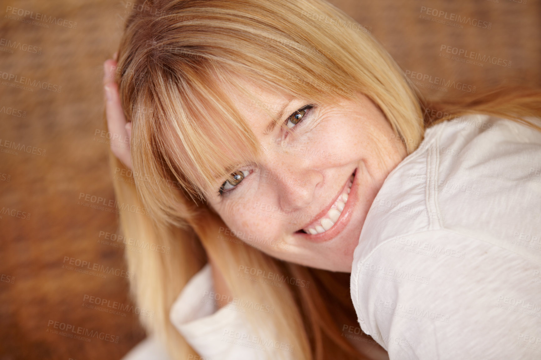 Buy stock photo Happy, woman and smile with portrait on face, relaxed and alone in home, natural beauty or headshot. Female, beautiful or thinking with idea, mature person and cheerful lady in house or blonde hair