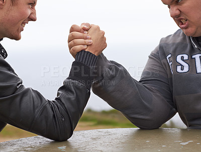 Buy stock photo Closeup, friends and competition with men and arm wrestling in nature for challenge, power and respect. Team, strong and conflict with hands of people and holding hands for muscle, match and rival